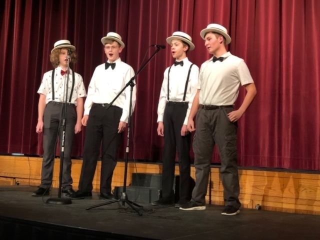 Quartet performs at middle school variety show