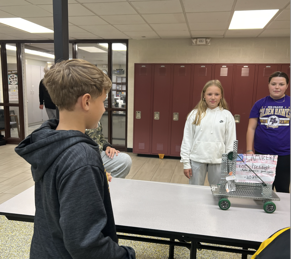Students showing pull toy project