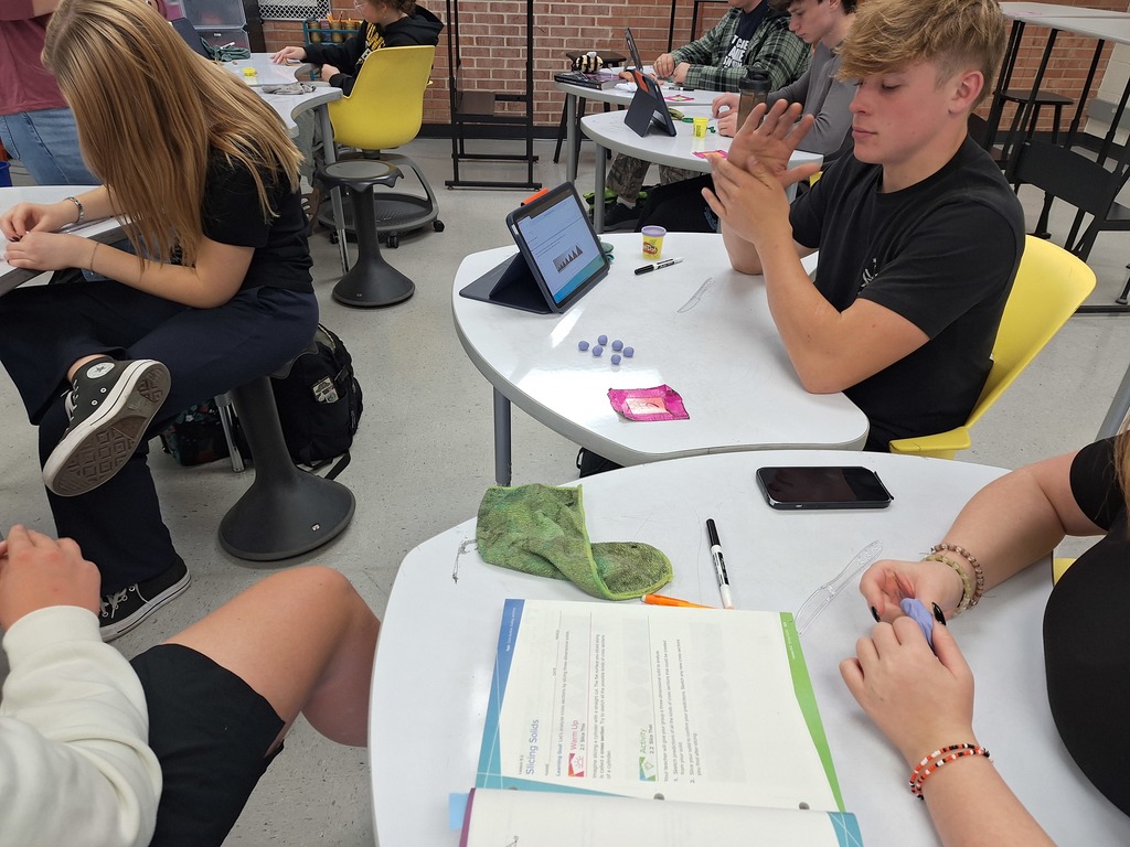 Students building play-doh models
