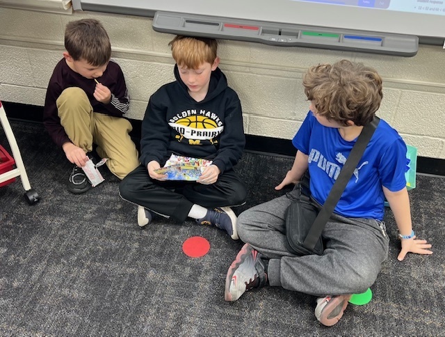 2nd grade students sharing their learning to 1st grade students
