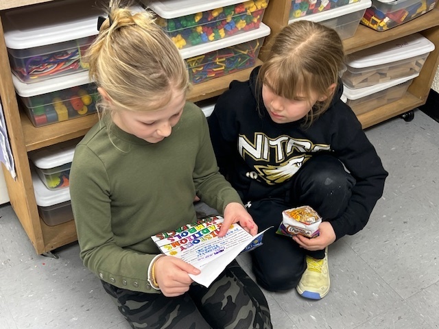 2nd grade students sharing their learning to 1st grade students