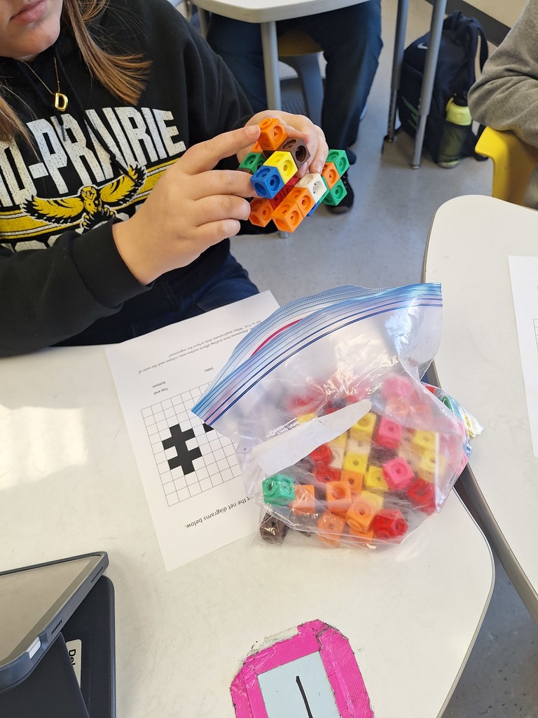 Student building with cubes