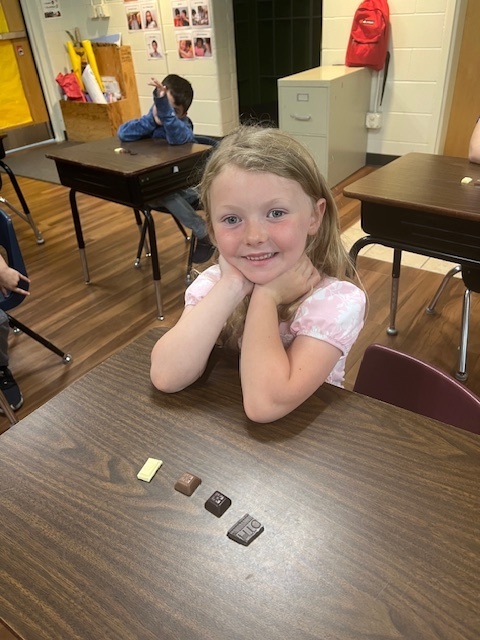 Kindergarten student with chocolate