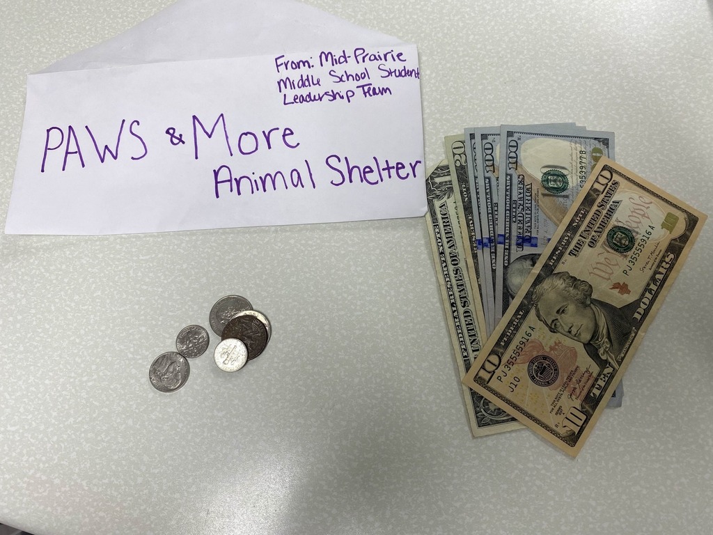 Photo showing $332 in donations
