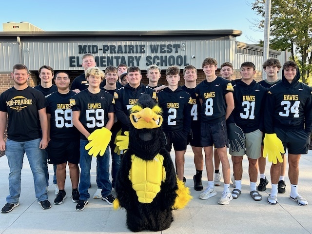 football players with mascot