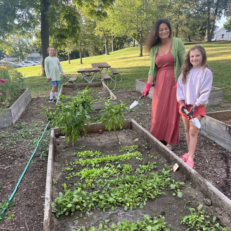 students and teacher gardening at MP-West Elementary