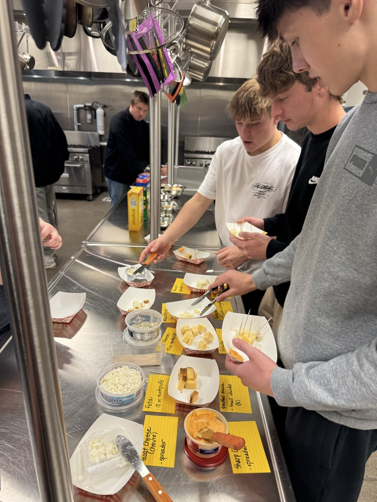 students tasting cheeses