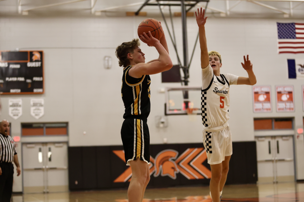 Brooks Weber shooting a basketball