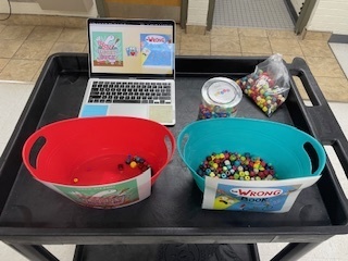 Student voting bins with skittles
