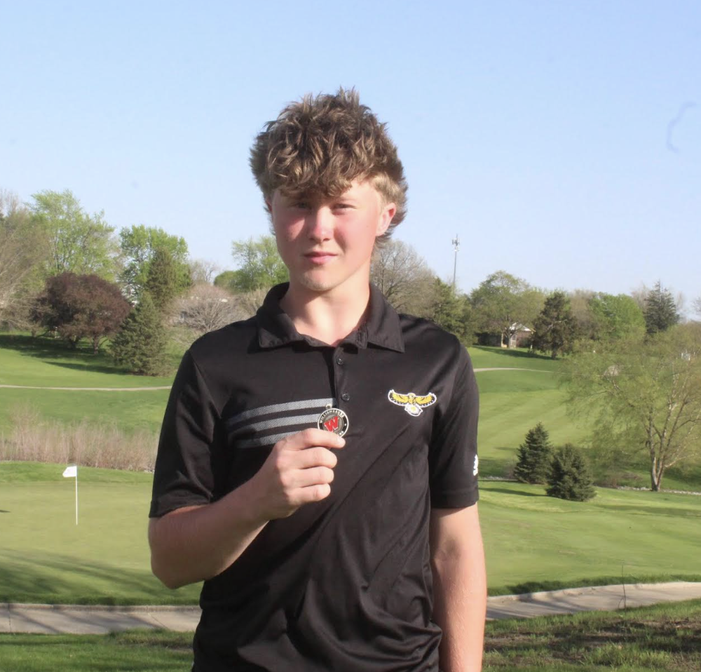 Grayson Gingerich with golf award
