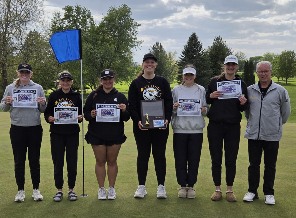 Congrats to the Mid-Prairie Girls Golf Teams for winning the River Valley Conference golf meet today in Muscatine. The girls finished with a score of 375, second place team shot a 397.  Congrats to Olivia Swartzendruber for finishing in 1st place as an individual with a score of 82 and Morgyn Bender for finishing in 3rd place with a score of 90.  Noelle Nelson,  Macie Ihrig and Delani Blum were all honorable mention all conference! Great job by Coach McArtor and the Hawks! Golf team members standing on the green each holding a certificate.