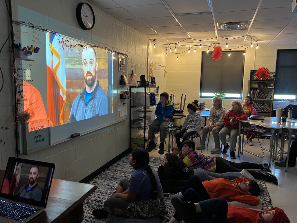 Students watching Veteran's Day video