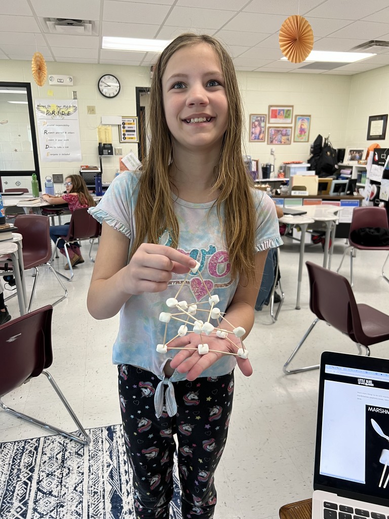 Student with her marshmallow tower