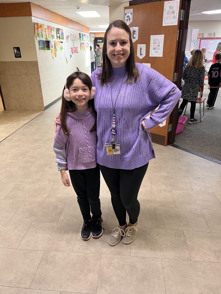 Mrs. Threlkeld and student in matching outfits