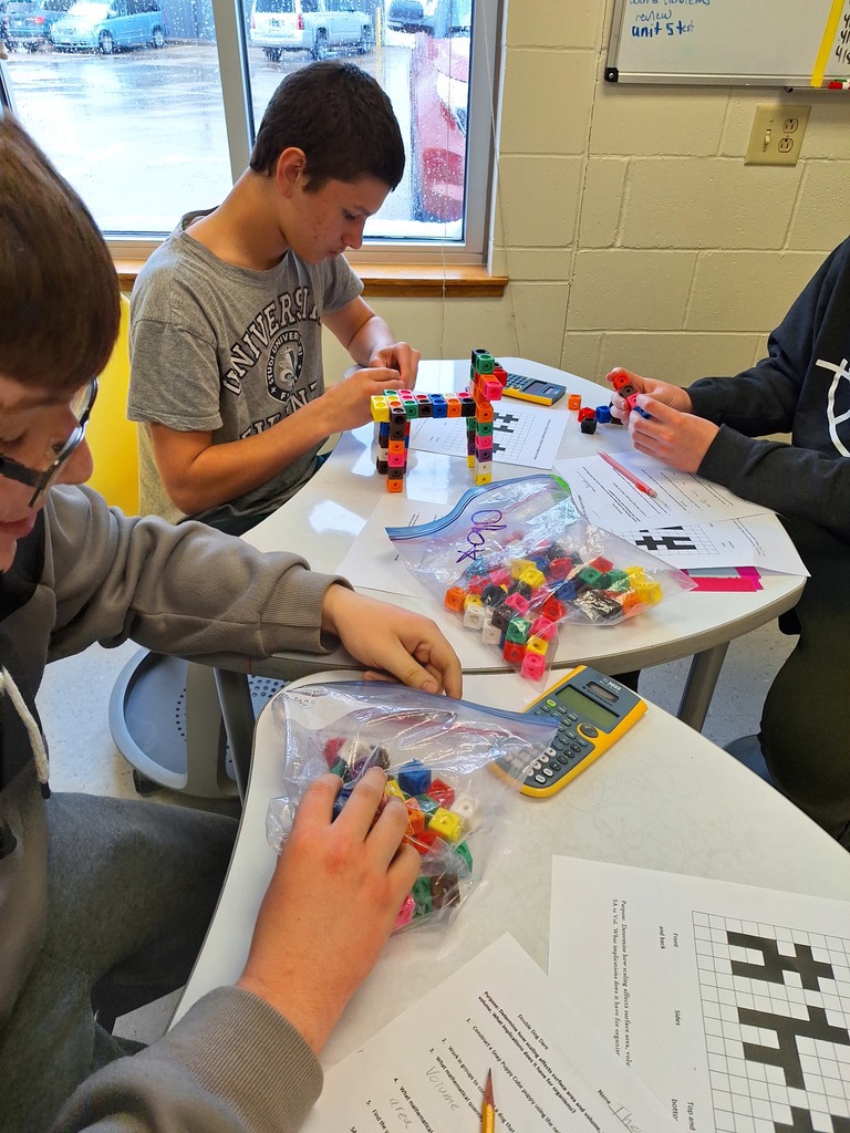Students building 3D cube animals