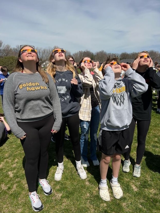 Students using eclipse classes to look at 4/8/24 eclipse