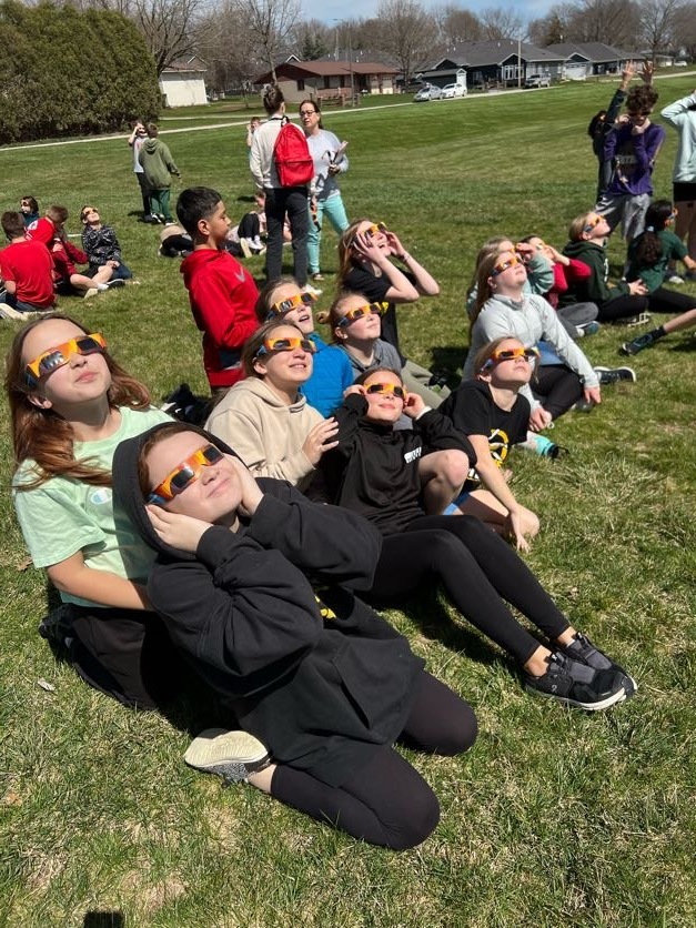 Students using eclipse classes to look at 4/8/24 eclipse