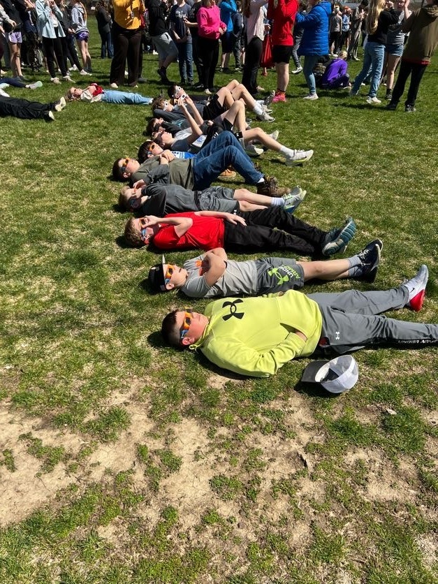 Students using eclipse classes to look at 4/8/24 eclipse