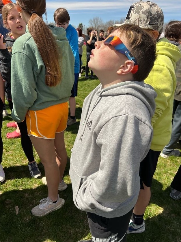 Students using eclipse classes to look at 4/8/24 eclipse