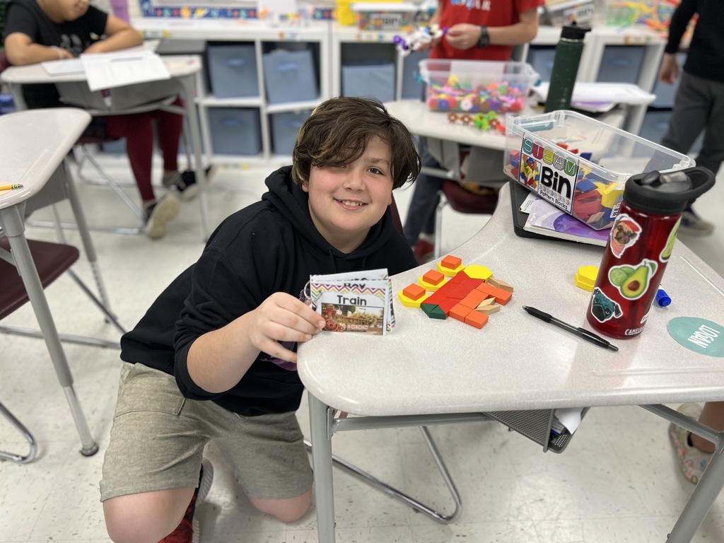 Student created a train out of tiles
