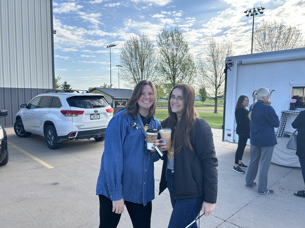 Staff members enjoying coffee from Juniper Roots