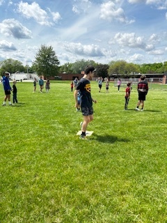MPMS students playing kickball with MP-East 2nd graders