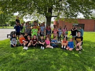 MPMS students with MP-East 2nd graders in a group photo