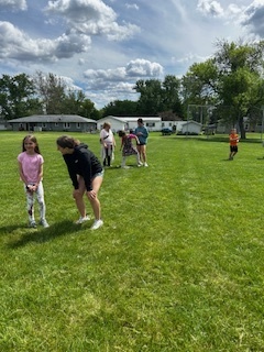 MPMS students playing kickball with MP-East 2nd graders