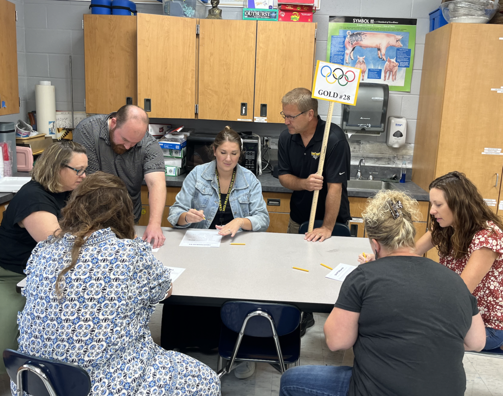 Teams working on solving a coded message