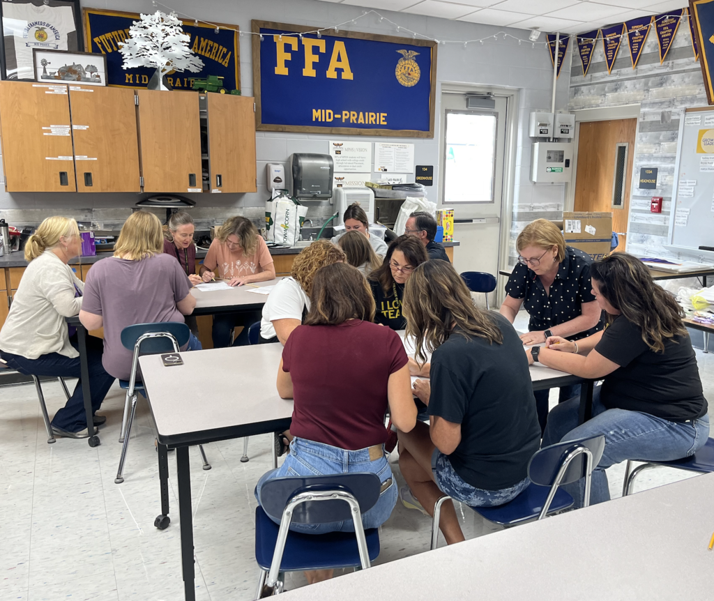 Teams working on solving a coded message