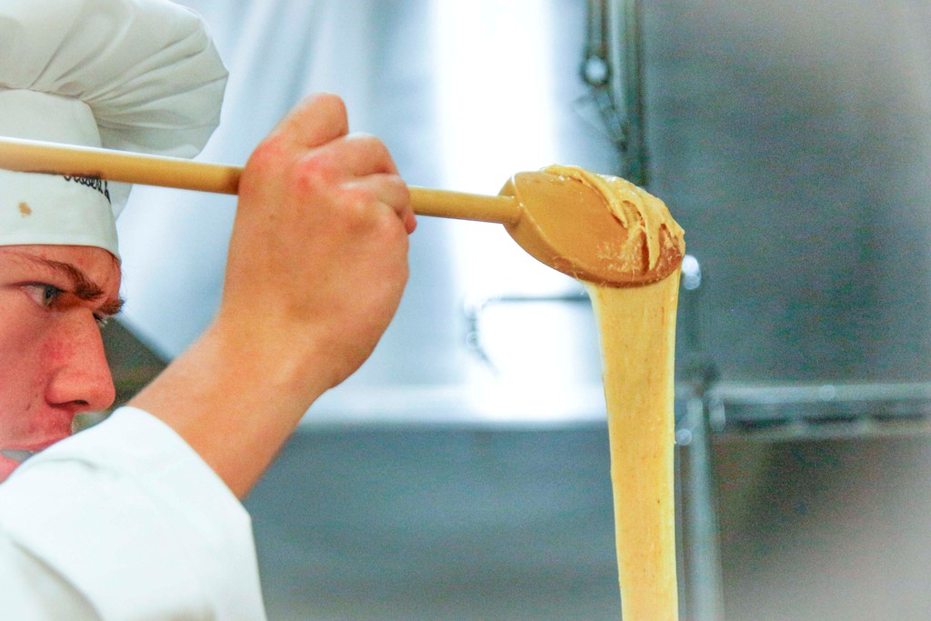 Culinary arts and science students working in their lab area And in their skills
