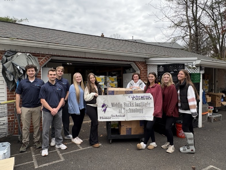 National Technical Honor Society students delivering food