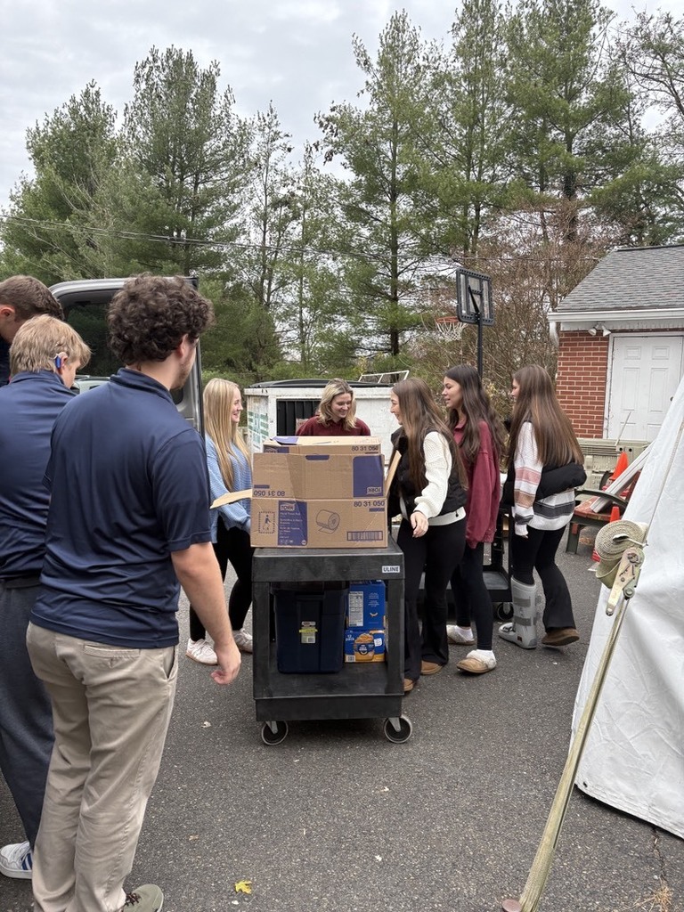 National Technical Honor Society students delivering food
