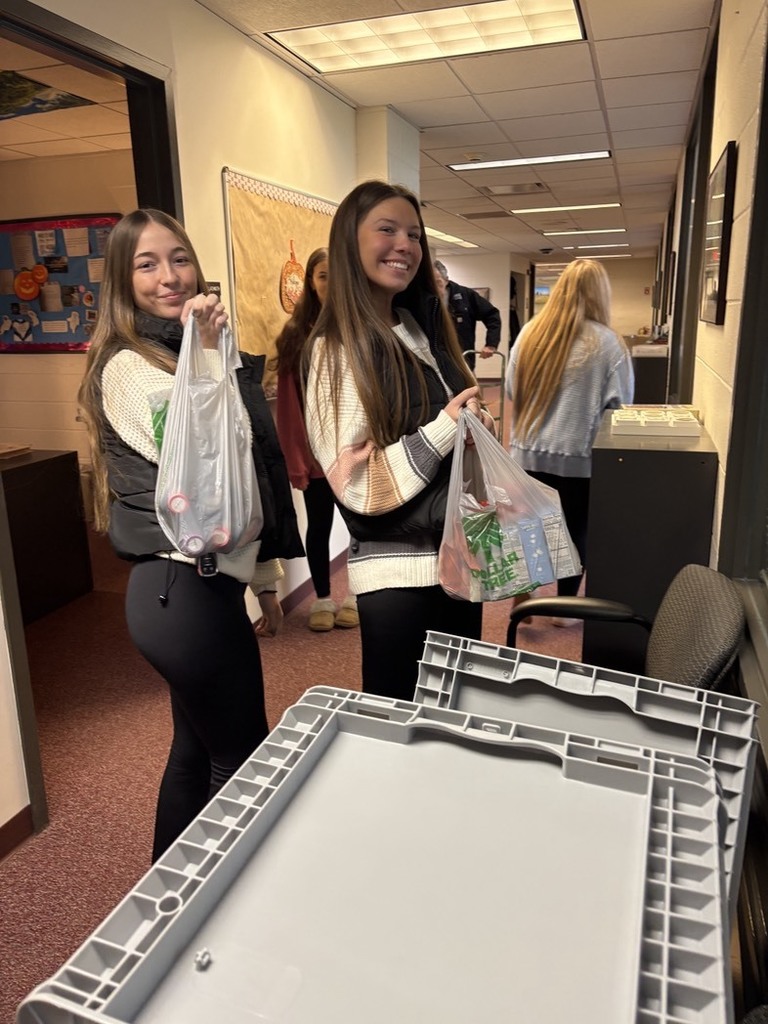 National Technical Honor Society students delivering food