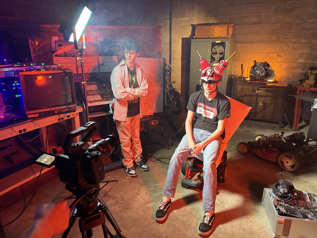 Those couple students working on their sci-fi film with some like fog and some special lighting
