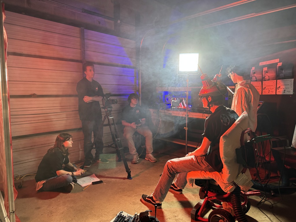 Behind the scene there in the garage, I'm working on their film. It's like five students working sci-fi film.