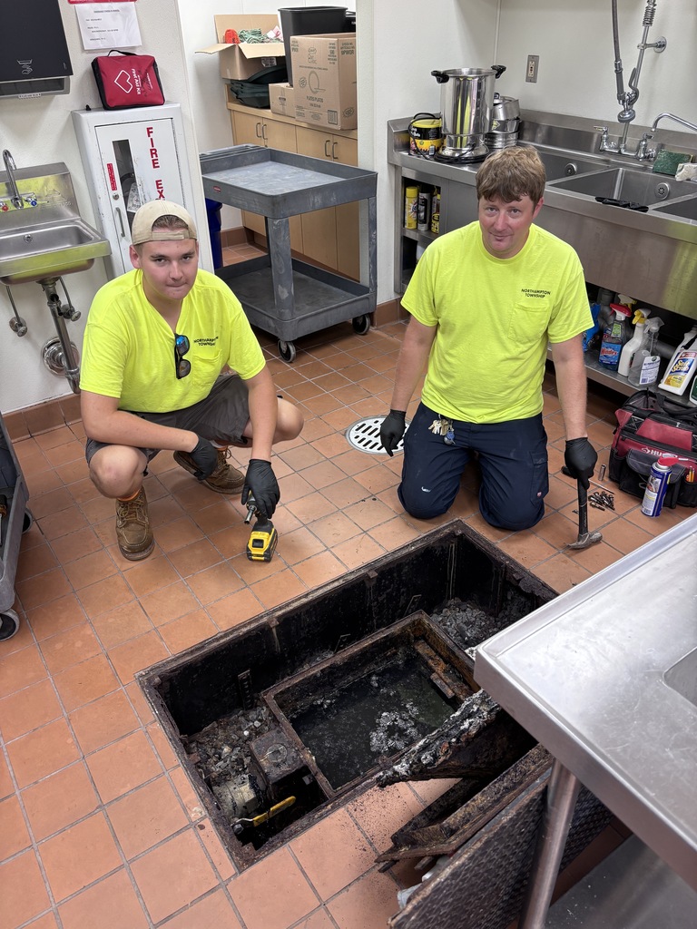 Is the photo of Rowan Erb he's on the website with a colleague or his mentor and they're working on something for Northampton public parks and yellow shirts, and smiles on their faces