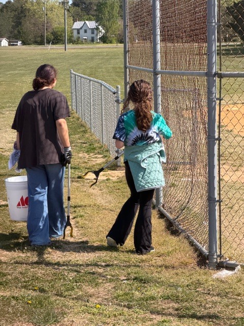 Students picking up trash.