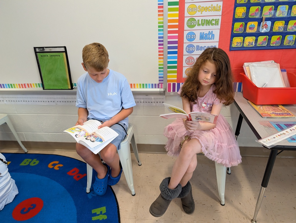 Two students reading.