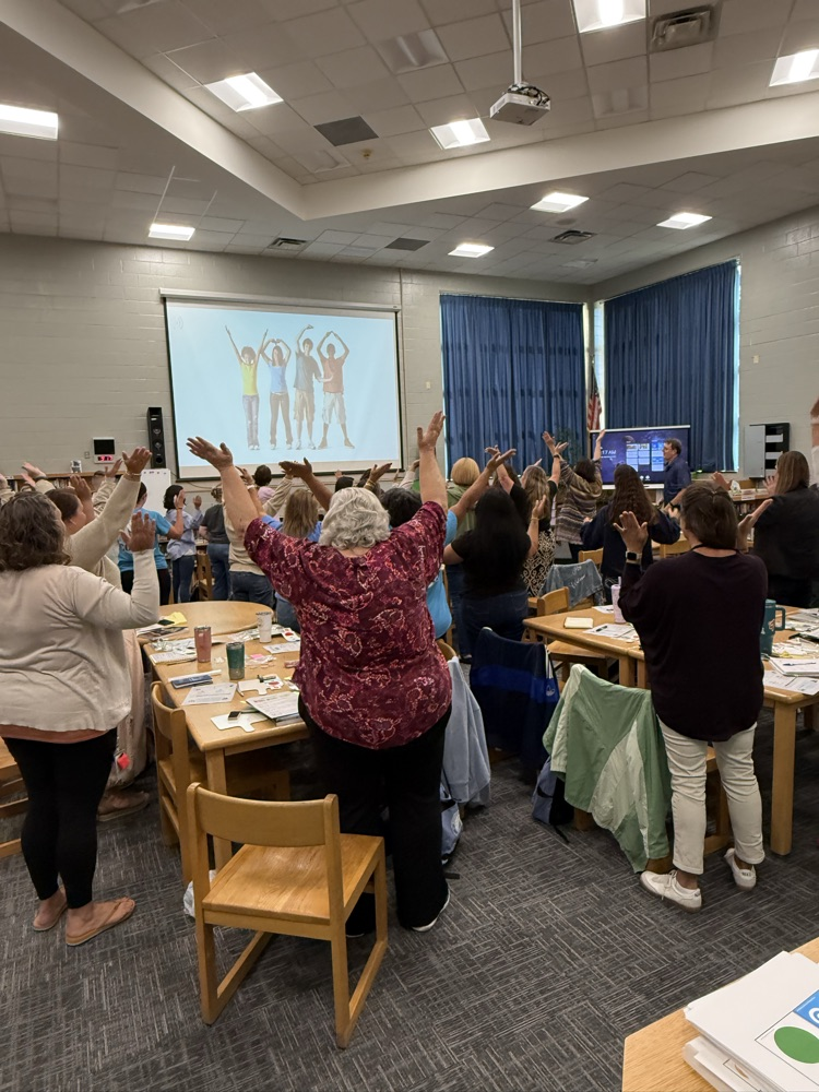 staff participating in PD