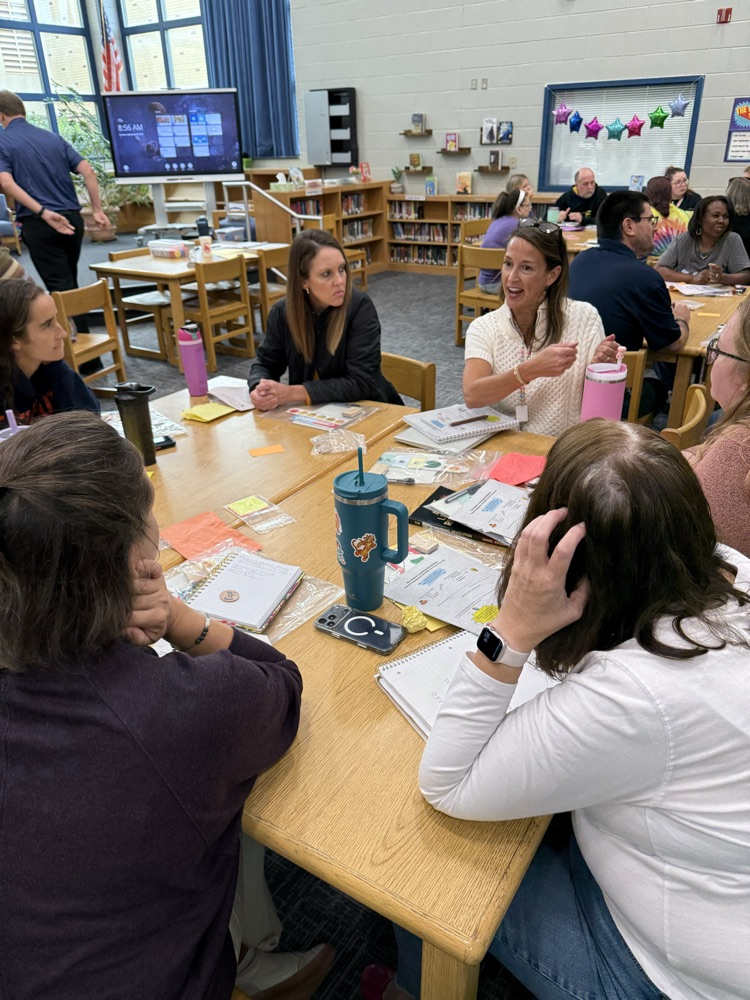 staff participating in PD