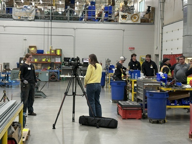Mary Gaffaney doing a media interview  at Hooper Corporation's Boot Camp eventng 