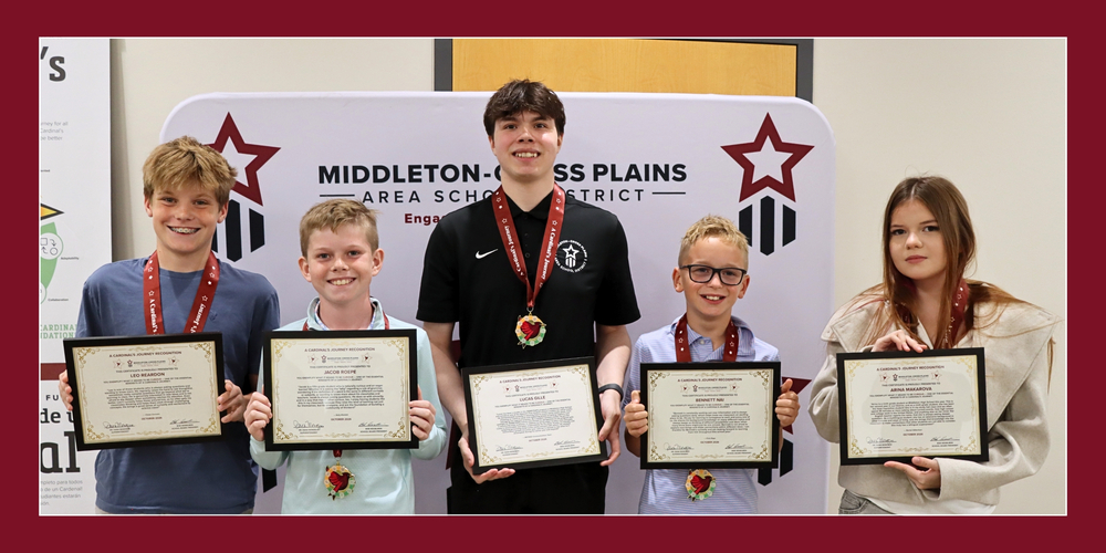 Five students smiling and holding their Cardinal's Journey Awards