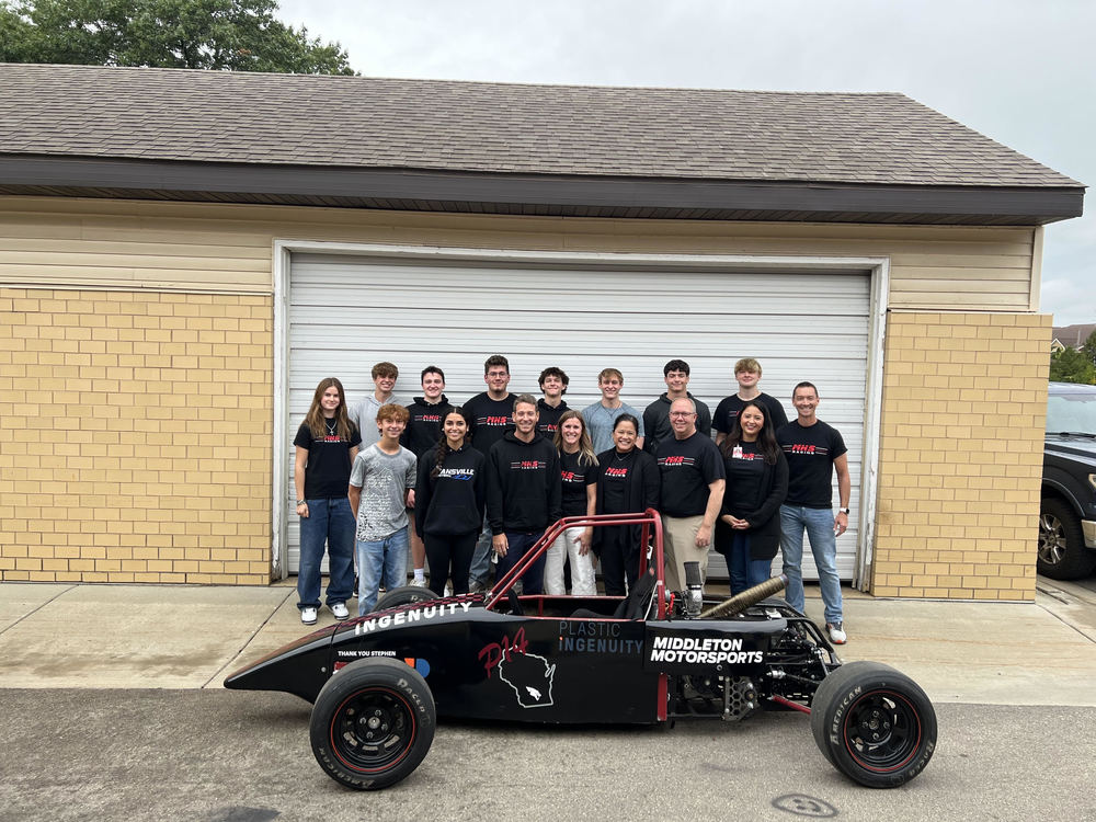 Middleton High School racing team with their racecar