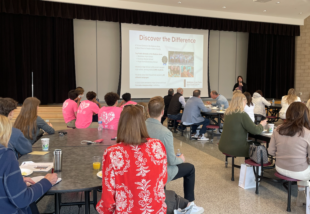 Dr. Dana Monogue presenting at 2025 Realtors Breakfast