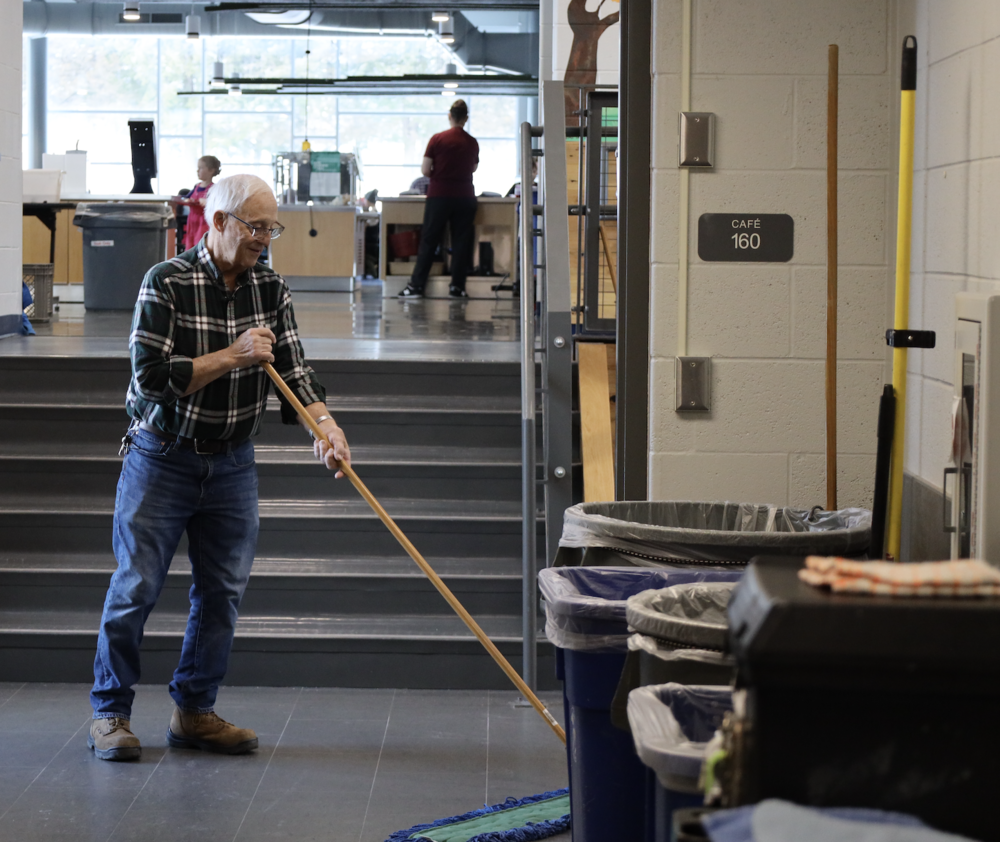Rodney "Mr. Peanuts" Esser mopping the floors at Park Elementary School