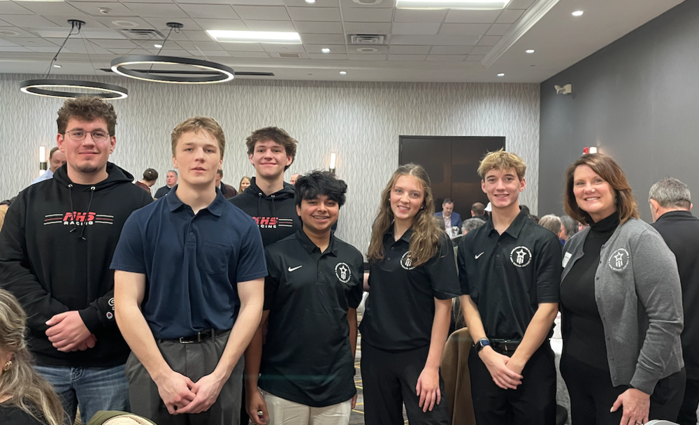 High school students with Superintendent Dr. Dana Mongoue 