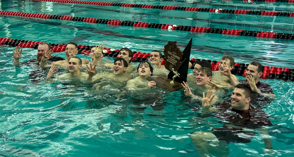 boys swim and dive state champions celebrate in the pool