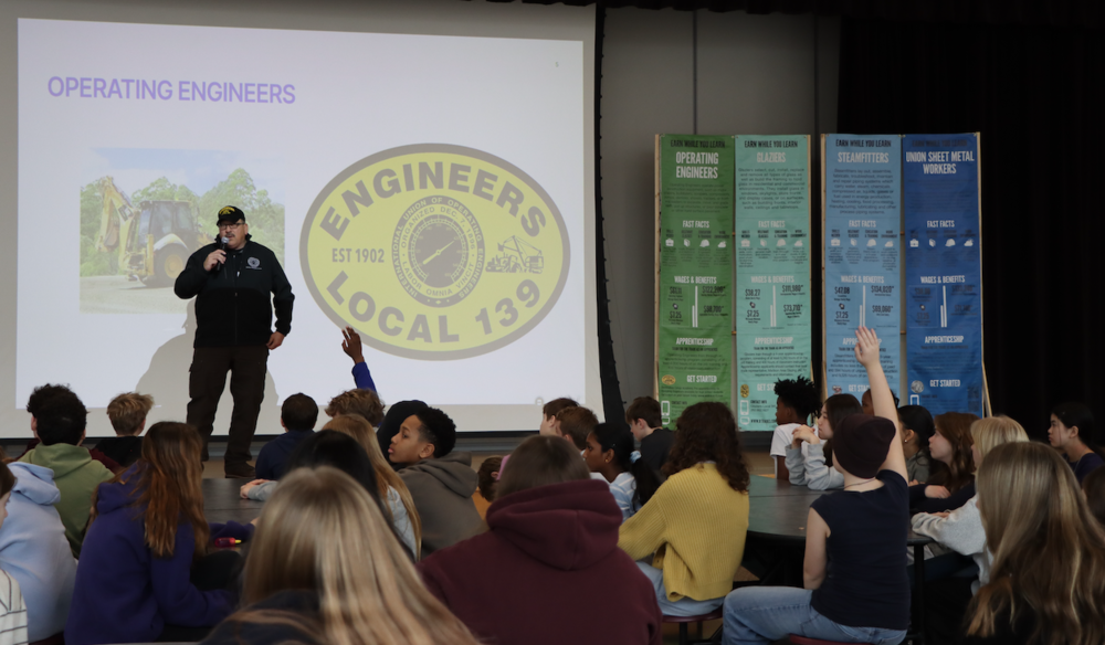 operating engineer talks with seventh graders