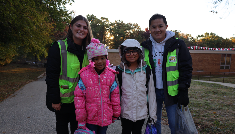 Grace Gengler, Lue Yang, and students at Sauk Trail Elementary School